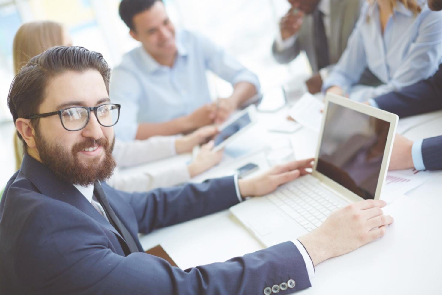 Small group discussion about investment fundamentals with diverse participants sharing experiences